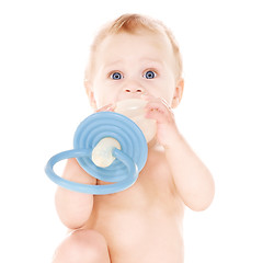 Image showing baby boy with big pacifier