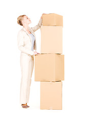 Image showing businesswoman with boxes