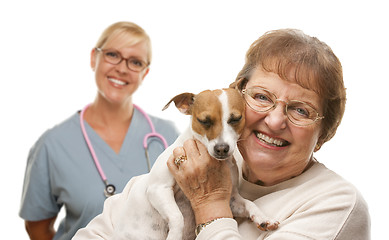 Image showing Happy Senior Woman with Dog and Veterinarian