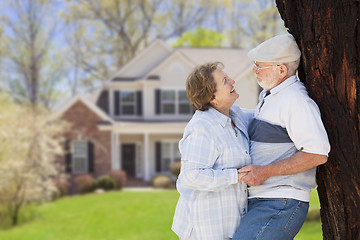 Image showing Happy Senior Couple in Front Yard of House