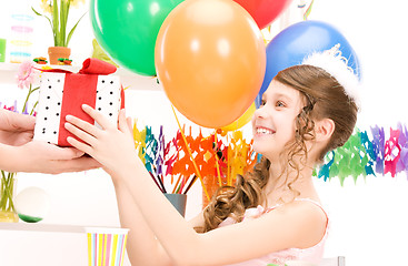 Image showing party girl with balloons and gift box