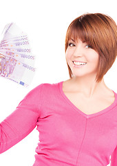 Image showing happy woman with money