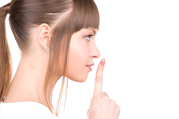 Image showing finger on lips