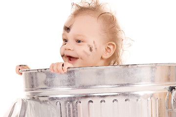 Image showing baby in trash can