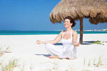 Image showing meditation on the beach