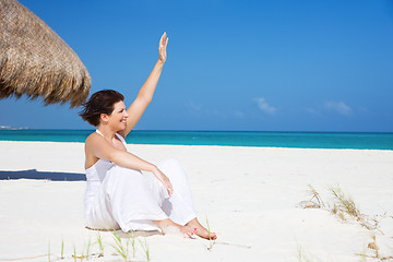 Image showing happy woman on the beach