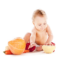 Image showing baby boy with vegetables