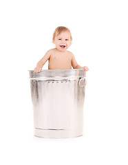 Image showing baby in trash can