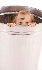 Image showing baby in trash can