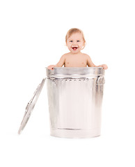 Image showing baby in trash can