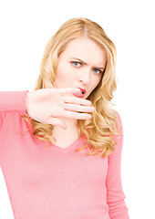 Image showing young woman making stop gesture