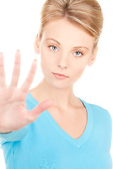 Image showing young woman making stop gesture