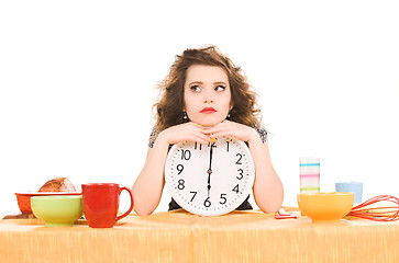 Image showing young attractive woman in the kitchen