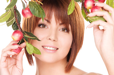 Image showing happy woman with apple twig