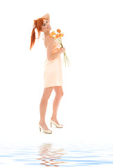 Image showing redhead with flowers