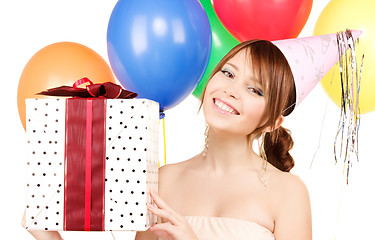 Image showing party girl with balloons and gift box