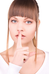 Image showing finger on lips