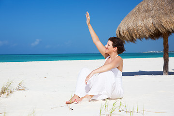 Image showing happy woman on the beach