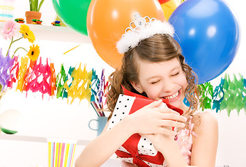 Image showing party girl with balloons and gift box