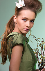 Image showing beautiful woman over green