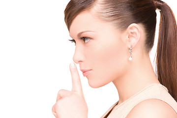 Image showing finger on lips