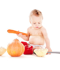 Image showing baby boy with vegetables