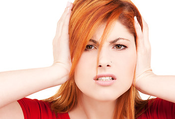 Image showing unhappy redhead woman