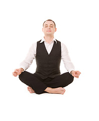 Image showing businessman sitting in lotus pose