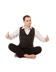 Image showing businessman sitting in lotus pose