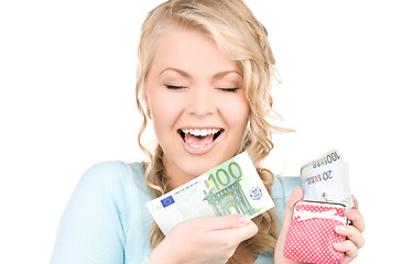 Image showing lovely woman with purse and money