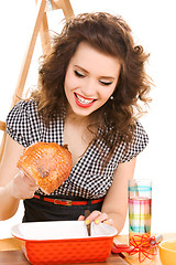 Image showing young attractive woman in the kitchen