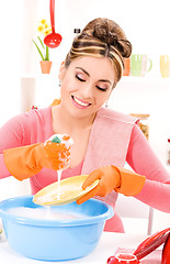 Image showing housewife washing dish