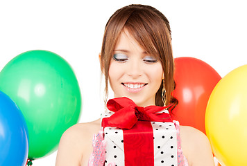 Image showing party girl with balloons and gift box