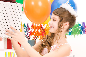 Image showing party girl with balloons and gift box