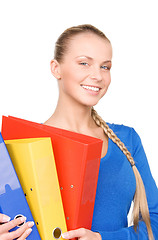 Image showing young attractive businesswoman with folders