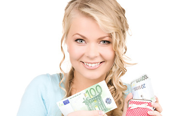 Image showing lovely woman with purse and money