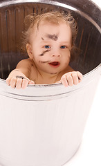 Image showing baby in trash can