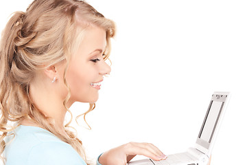 Image showing happy woman with laptop computer