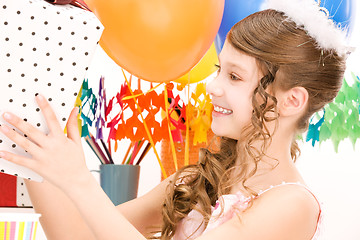 Image showing party girl with balloons and gift box