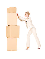 Image showing businesswoman with boxes