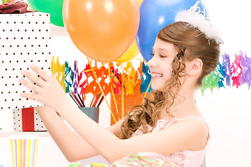 Image showing party girl with balloons and gift box