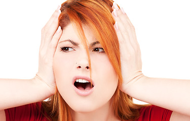 Image showing unhappy redhead woman