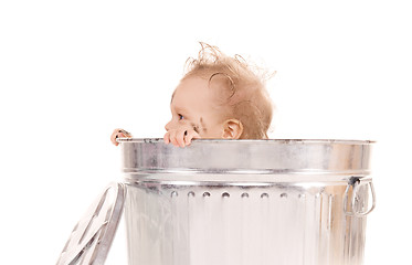 Image showing baby in trash can