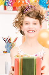 Image showing party girl with balloons and gift box