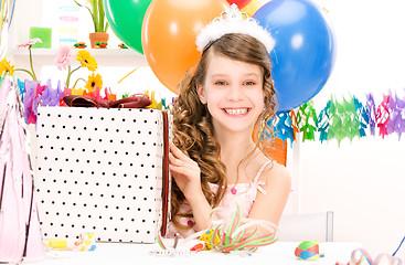 Image showing party girl with balloons and gift box