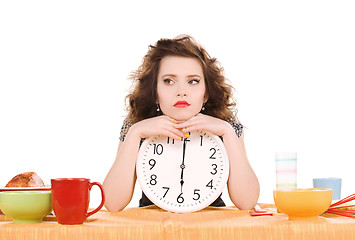 Image showing young attractive woman in the kitchen