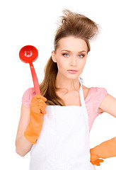 Image showing housewife with red ladle