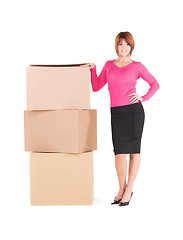 Image showing businesswoman with boxes