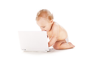 Image showing baby boy in diaper with laptop computer