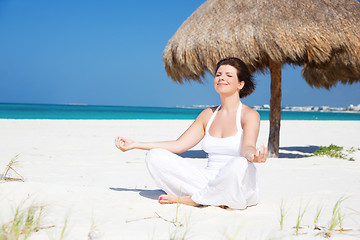 Image showing meditation on the beach